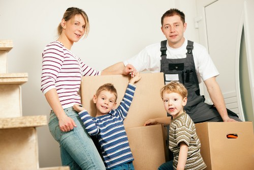 Staff following safe procedures in a storage setting