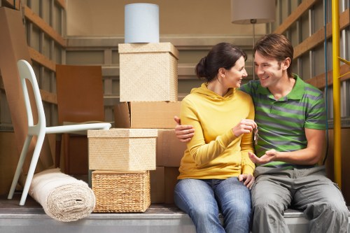 Packed boxes and furniture prepared for temporary storage